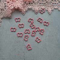 Пряжка для лялькового одягу метелик 11*7мм рожева