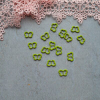 Пряжка для лялькового одягу метелик 11*7мм салатова