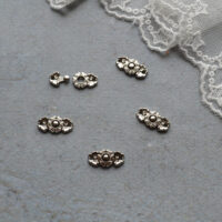 Застібка для лялькового одягу срібло 15*7мм 1шт FK030