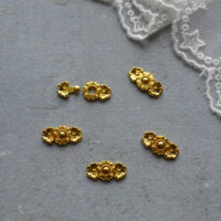 Застібка для лялькового одягу золото 15*7мм 1шт FK031