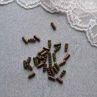 Міні фіксатор для шнура без пружини 7мм бронза 4шт. FR012