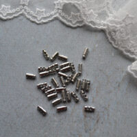 Міні фіксатор для шнура без пружини 7мм срібло 4шт FR013