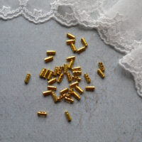 Міні фіксатор для шнура без пружини 7мм золото 4шт FR011