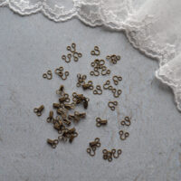 Застібки для одягу ляльки міні гачечки 10шт. Бронза FK022