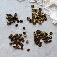 Міні кнопки для одягу ляльки 6мм бронза FK015