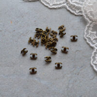 Міні ґудзики Chanel  на ніжці бронза 7*5мм 10шт B027