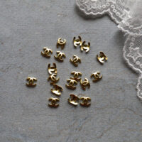 Логотип округлий Chanel 7*6 мм світле золото 2шт LO006